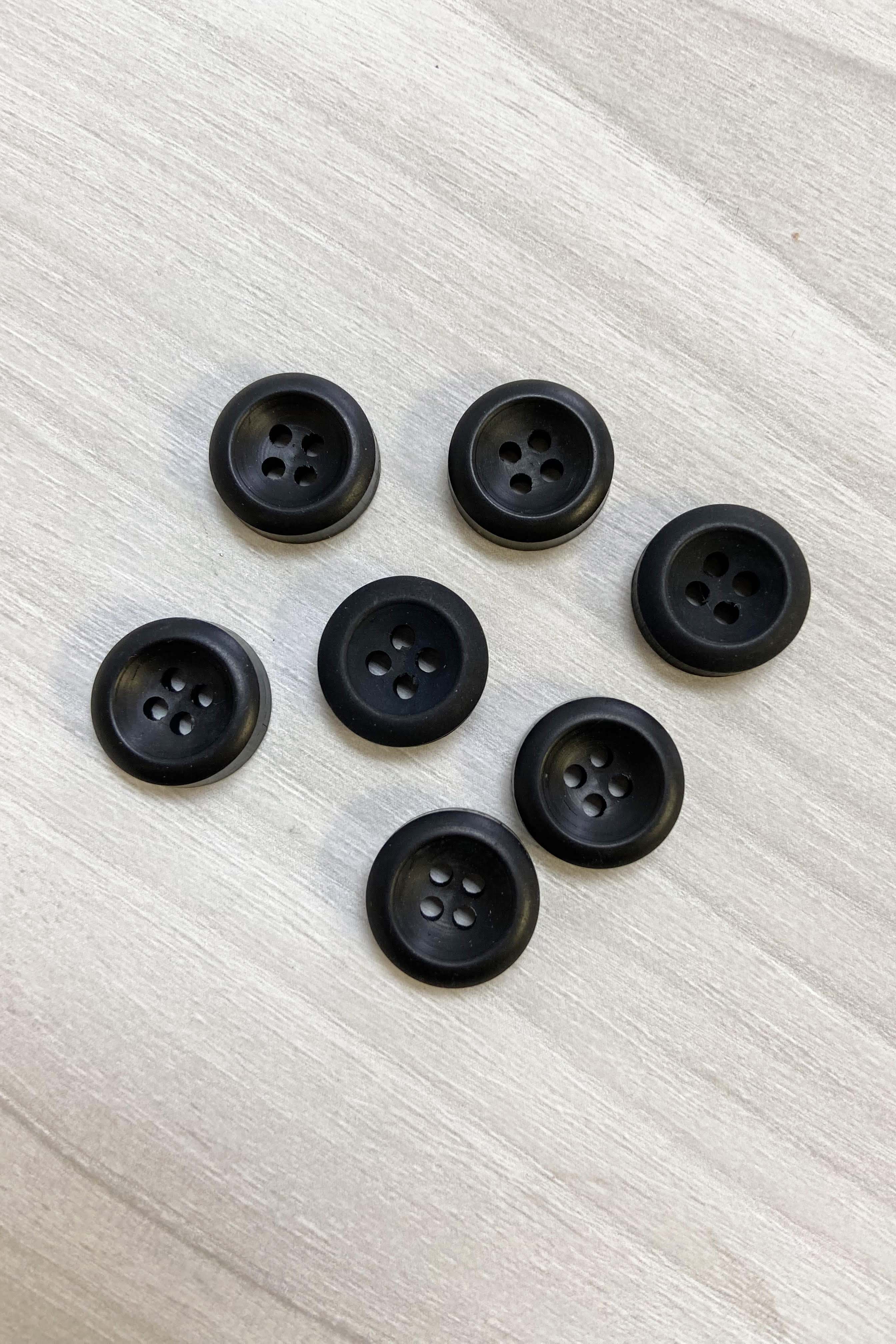 Bouton noir 4 trous 15mm