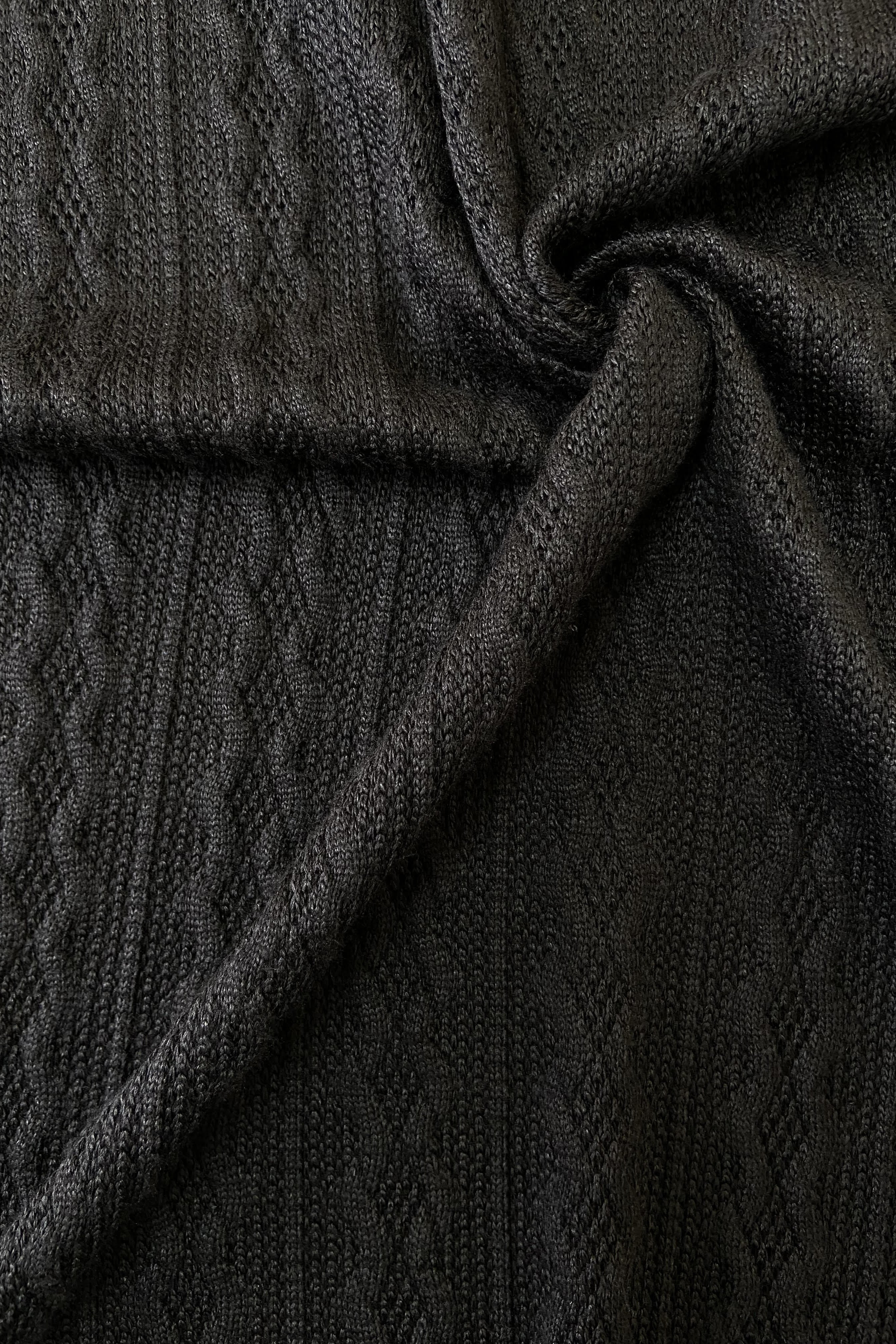 Tricot torsade noir